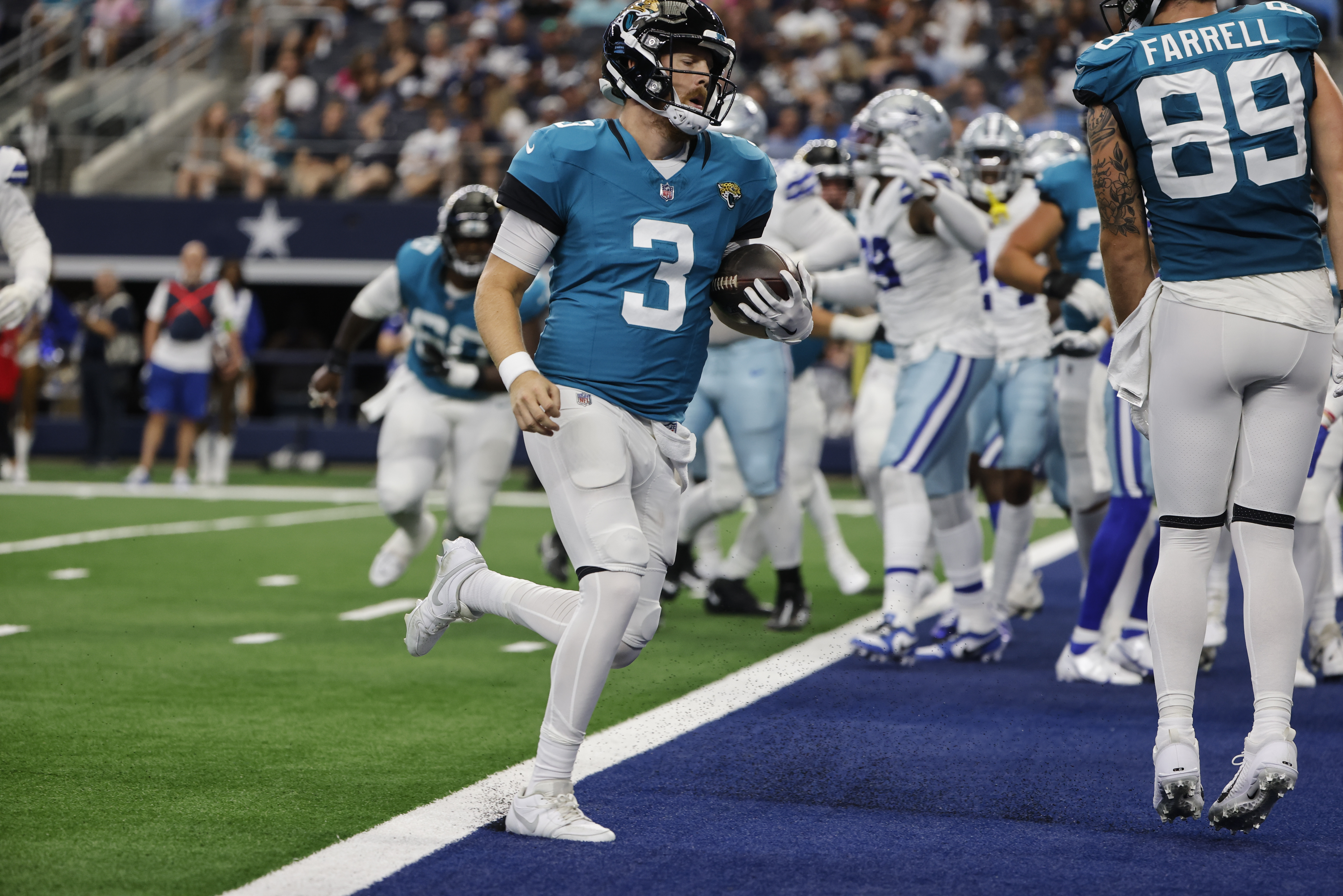 Dallas Cowboys running back Rico Dowdle (23) runs the ball during the first  half of an NFL preseason football game against the Jacksonville Jaguars,  Saturday, Aug. 12, 2023, in Arlington, Texas. Later