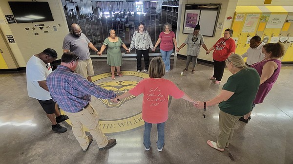 WC staff pray over halls of school - Vimarsana News