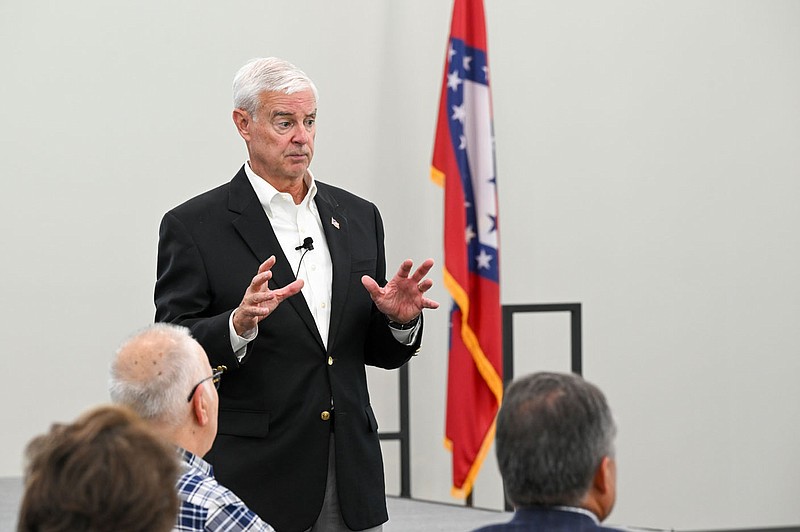 U.S. Rep. Steve Womack, R-Ark. speaks at the Fort Smith Regional Alliance Board Meeting on Tuesday at the Peak Innovation Center in Fort Smith. The Fort Smith Regional Alliance is an organization compromised of community leaders within 50 miles of Fort Smith. Representative Womack updated the Alliance members on things going on at the Federal Level that could potentially affect the area such as potential D.O.D budget cuts and construction on I-49. Visit nwaonline.com/photo for today's photo gallery. 
(NWA Democrat-Gazette/Caleb Grieger)