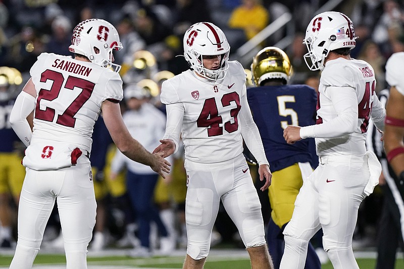 Ohio State wide receiver Marvin Harrison Jr., right, catches a touchdown  during the first half in the Rose Bowl NCAA college football game against  Utah Saturday, Jan. 1, 2022, in Pasadena, Calif. (