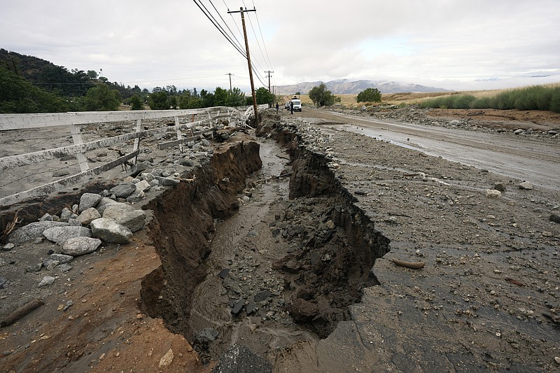 California towns dig out of mud from first tropical storm in 84 years