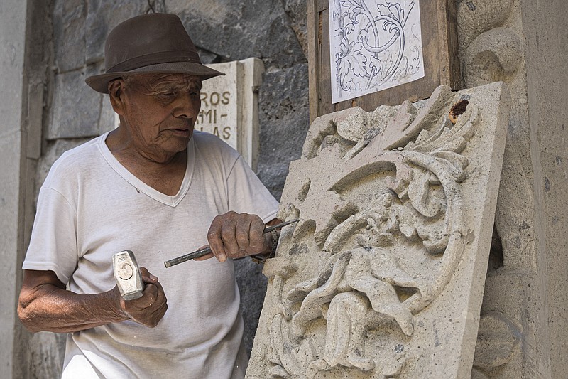 Traditional stone carvers chisel on despite loss of quarries in village