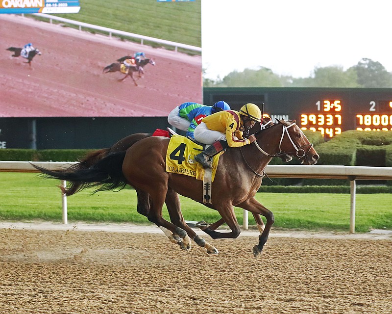 Clairiere, under Joel Rosario, just beats Secret Oath to win the Grade 1 $1 million Apple Blossom Handicap April 15 at Oaklawn. - Photo courtesy of Coady Photography