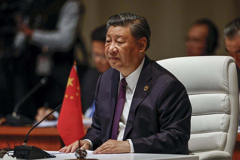 China's President Xi Jinping attends the plenary session during the 2023 BRICS Summit in Johannesburg, South Africa, Wednesday, Aug. 23, 2023. (Gianluigi Guercia/Pool via AP)
