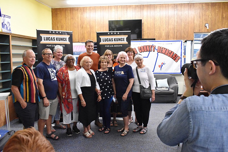 Democrat photo/Garrett Fuller — Members of the Miller County Democratic Committee pose for a picture with U.S. Senate candidate Lucas Kunce, center, on Wednesday (Aug. 23) after a town hall at the Moniteau County Democrats headquarters in California.