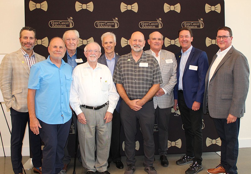 Previous Bill Fleeman Gentleman of Distinction honorees Dr. Lucas Campbell (from left), Philip Taldo, Sid Davis, Dick Trammel, Jeff Brazzeal, Mike Thurow, Randy Koontz and Dr. Thad Beck and 2023 Gentleman of Distinction gather Aug. 25 at the VIP reception for the Hope Cancer Resources fundraiser, which is set for Sept. 15.
(NWA Democrat-Gazette/Carin Schoppmeyer)