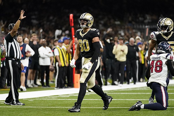 New Orleans, USA. 27th Aug, 2023. Houston Texans quarterback C.J. Stroud  (7) attempts a pass while facing a heavy pass rush from New Orleans Saints  defensive ends Tanoh Kpassagnon (92) and Carl