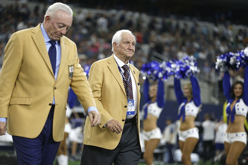 Hall Of Fame inductee Gil Brandt, right, was presented with his HOF ring by Dallas Cowboys team owner Jerry Jones, left, during a halftime ceremony during a game against the Green Bay Packers Oct. 6, 2019, in Arlington, Texas. - Photo by Ron Jenkins of The Associated Press