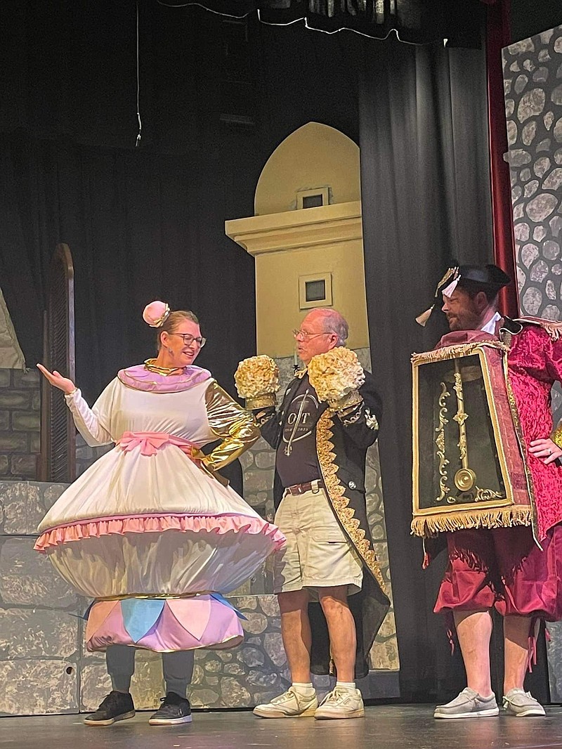 Courtesy/ Andrew Korte
Julie Gragert as Mrs. Potts, David Merritt as Lumiere and Jeromy Layman as CogsWorth rehearse their roles before the Finke Theatres premiere of “Beauty and the Beast” on Sept. 22.