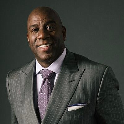 Magic Johnson meets with Washington Commanders players for the