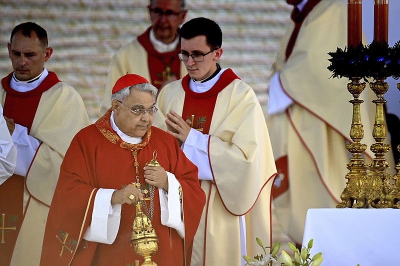 Papal envoy Cardinal Marcello Semeraro leads a Mass in which the Vatican beatified the Polish Ulma family, including small children, who were killed by the Nazis in 1944 for having sheltered Jews, in the Ulmas' home village of Markowa, Poland, on Sunday, Sep.10, 2023. The Vatican beatified also the Ulmas' unborn child, saying it was born during the killings and was baptized in the martyred mother's blood. (AP Photo)
