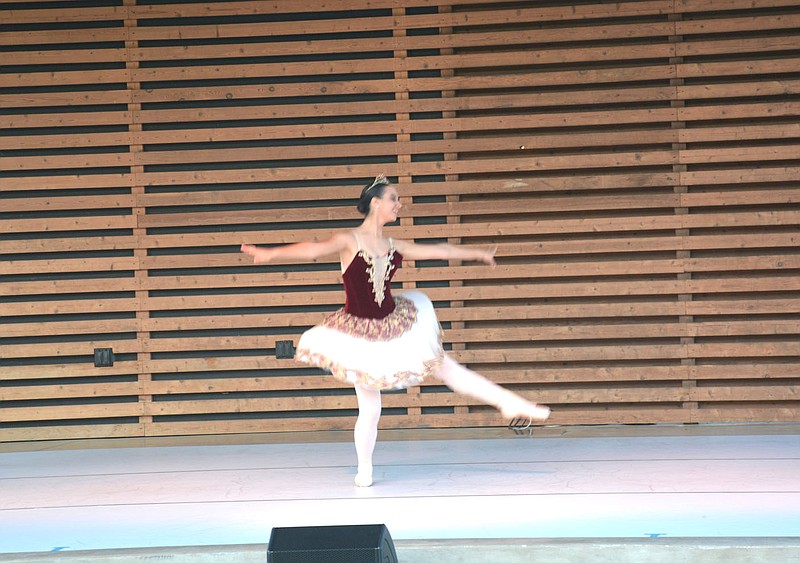 Marc Hayot/Herald-Leader Dancer Maria Dumond performs a solo dance at the Ozark Ballet Theatre's performance on Saturday, Sept. 9, at the Chautauqua Amphitheater.