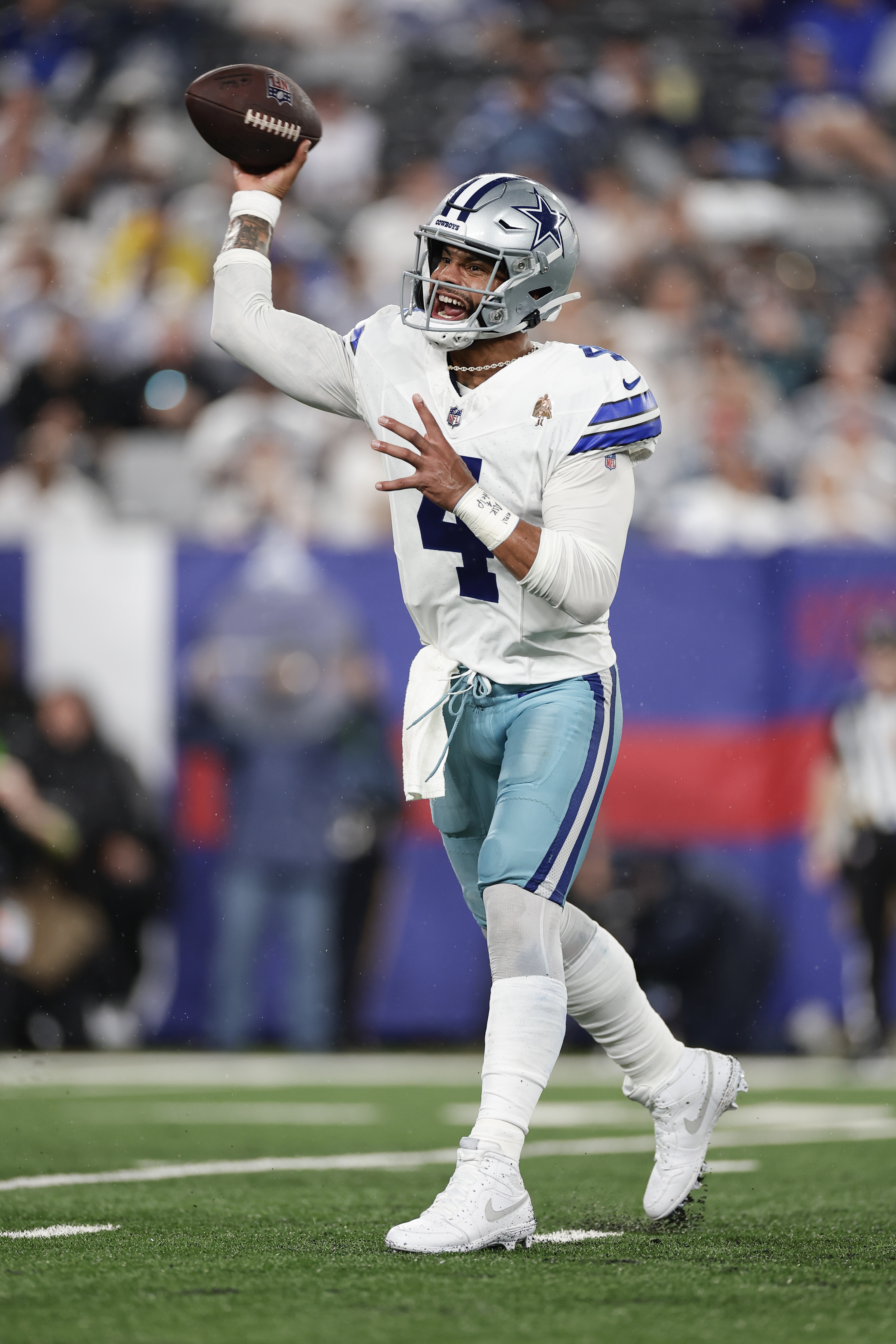 Dallas Cowboys quarterback Dak Prescott throws the ball during the second  half of an NFL footba …