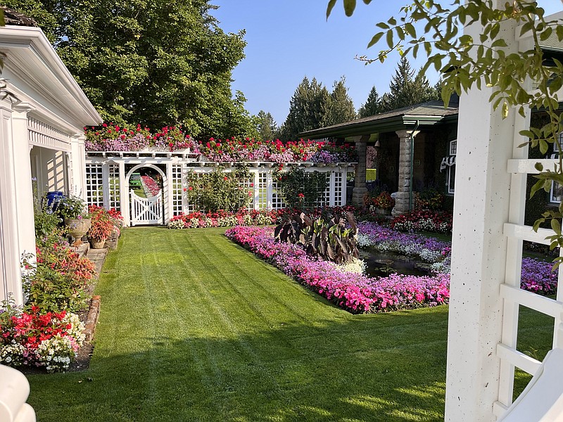 Flowers embellish every section of this outdoor room at Butchart Gardens in British Columbia. (Special to the Democrat-Gazette/Janet B. Carson)