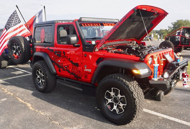 Susan Holland/Westside Eagle Observer
This 2020 Jeep Wrangler Sport displays a custom Razorback paint job and a number of Razorback decorations. The vehicle, owned by Richard Crouch of Joplin, Mo., took second place in the 4x4 division and tied for third place in the custom mild division. Crouch is president of the Quad State Jeep Club.