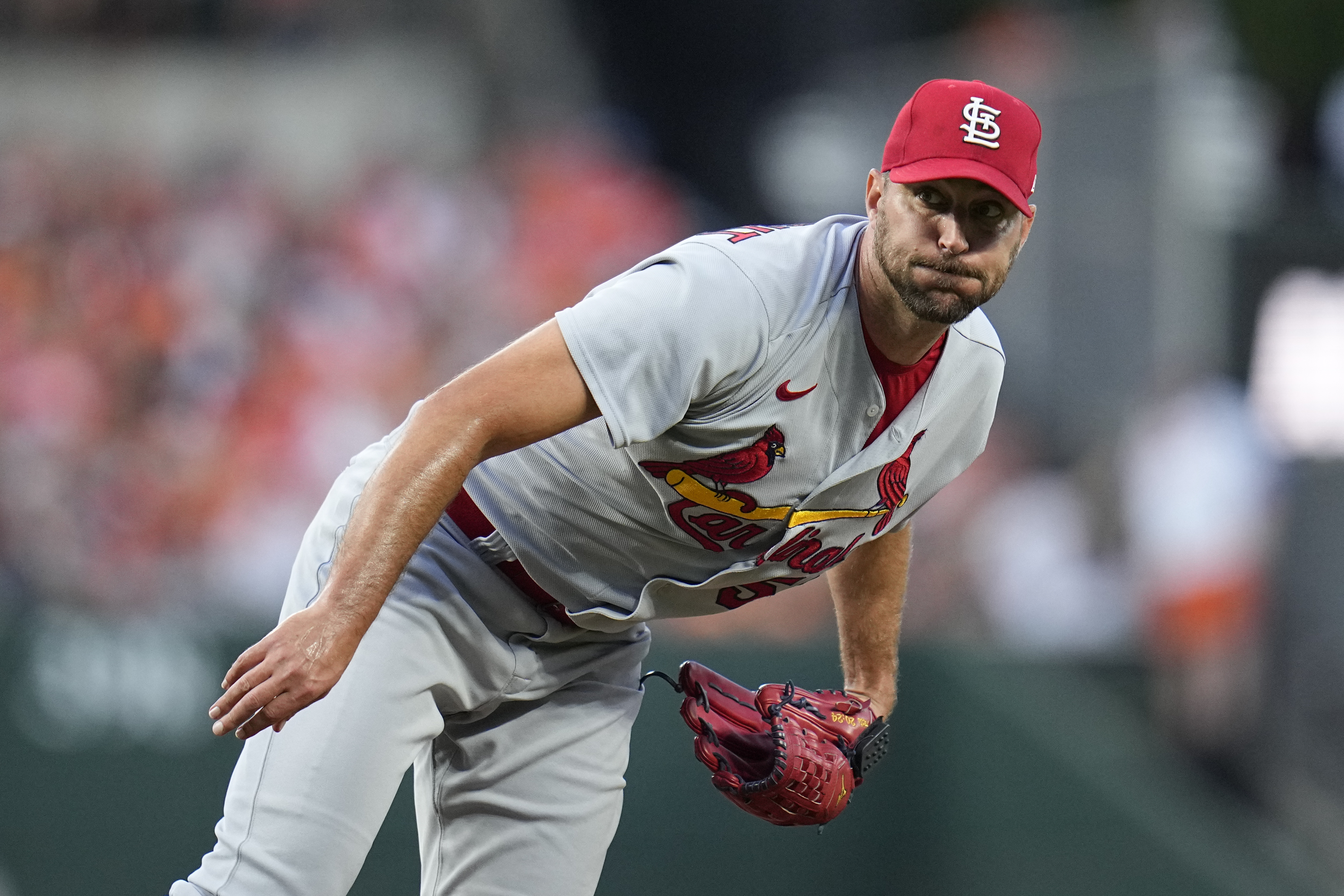 Adams leads Cardinals past Cubs