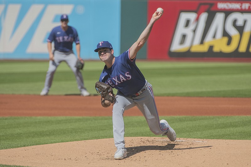 Cody Bradford of the Texas Rangers pitches in the sixth inning