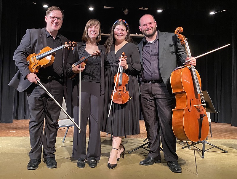 The Arkansas Symphonys Quapaw Quartet — (from left) Timothy MacDuff, viola; Charlotte Crosmer and Lauren Pokorzynski, violins; and Travis Scharer, cello — play a Beethoven string quartet for Tuesdays River Rhapsodies season opener at the Clinton Presidential Center in Little Rock.

(Special to the Democrat-Gazette)