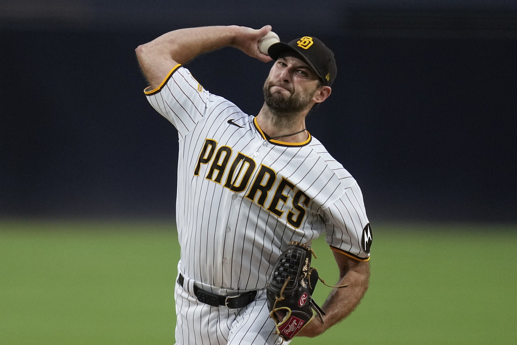 Garrett Cooper of the San Diego Padres hits a solo home run during