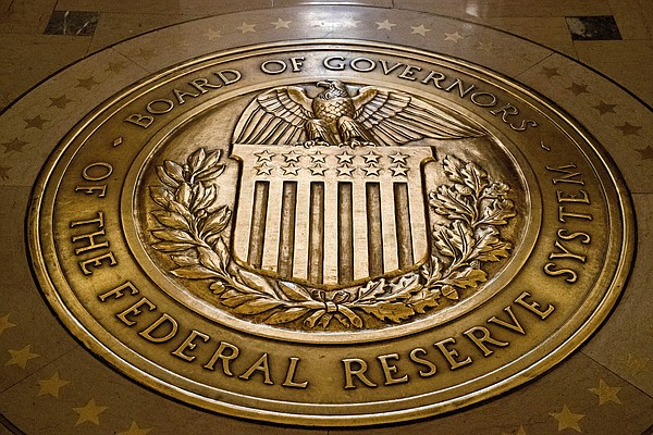 Fed keeps rates unchanged but signals likelihood of another hike this year to fight inflation