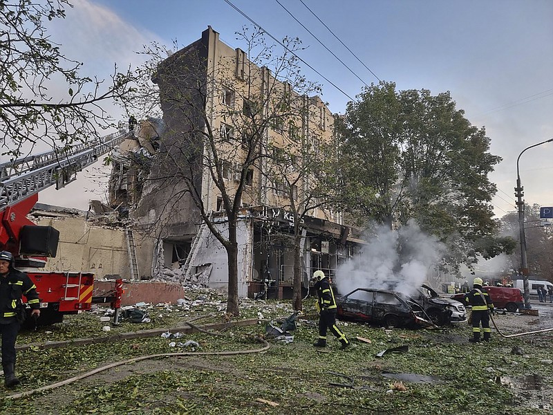 Emergency services personnel work to extinguish a fire on Thursday following a Russian attack in Cherkasy, Ukraine.
(AP/Ukrainian Emergency Service)