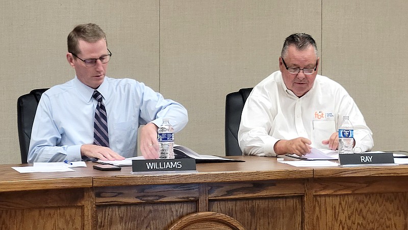 White Hall School Board Superintendent Gary Williams, left, and board member Scott Ray conduct a special board meeting Thursday, Sept. 21, 2023. (Pine Bluff Commercial/I.C. Murrell)