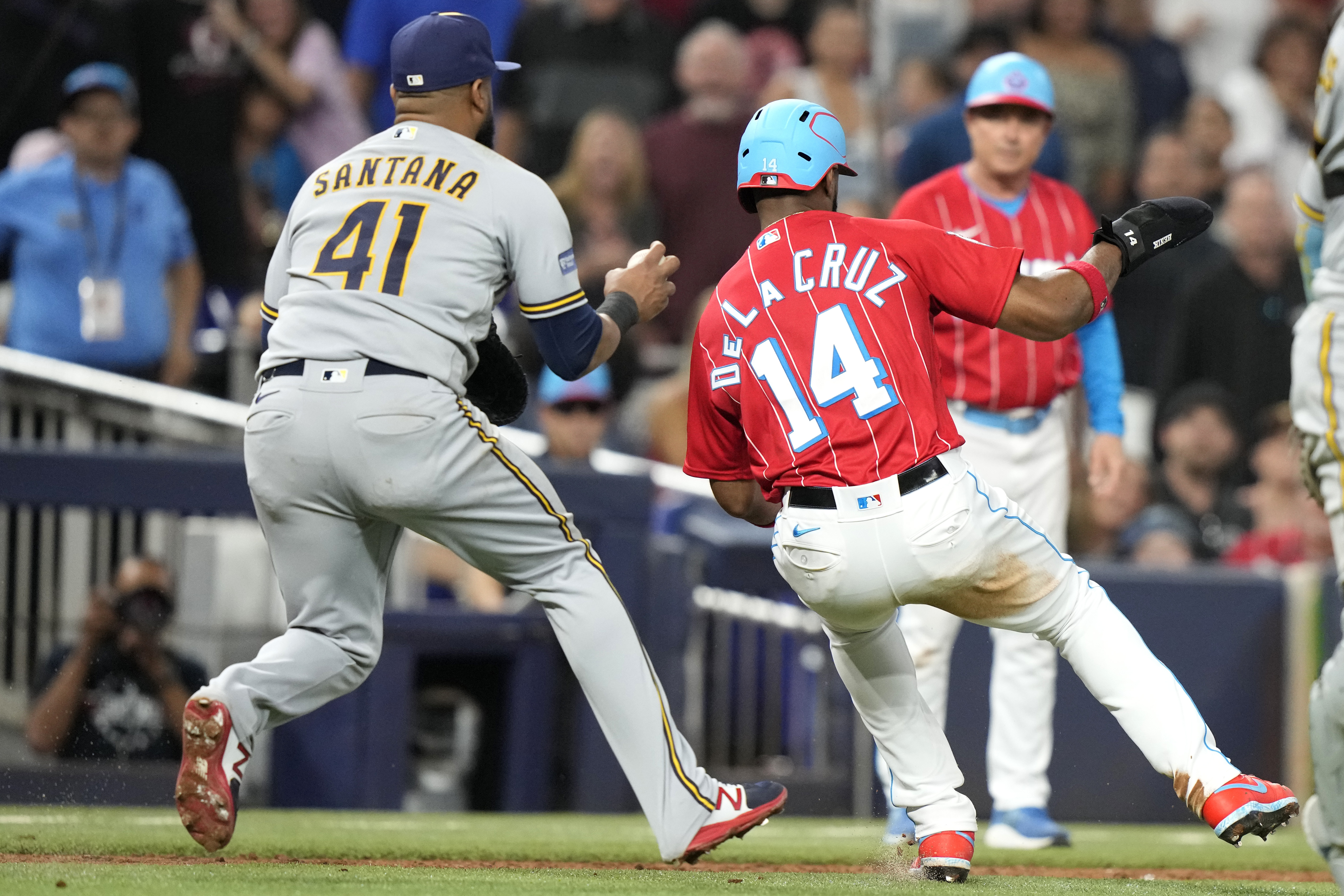 Marlins beat Brew Crew to stay in wild card race