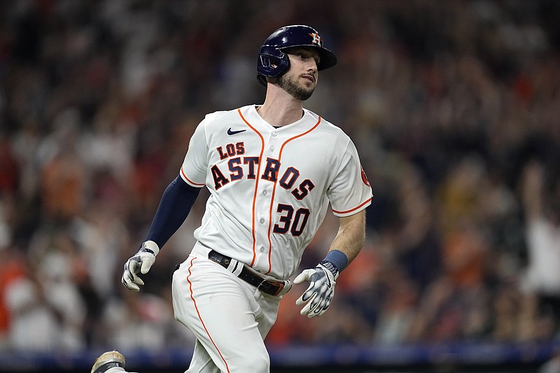 Houston Astros' Yainer Diaz runs up the first base line against