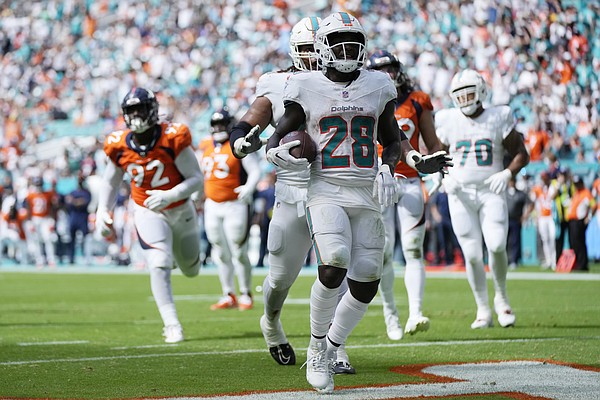 The Miami Dolphins put up video game numbers against the Denver