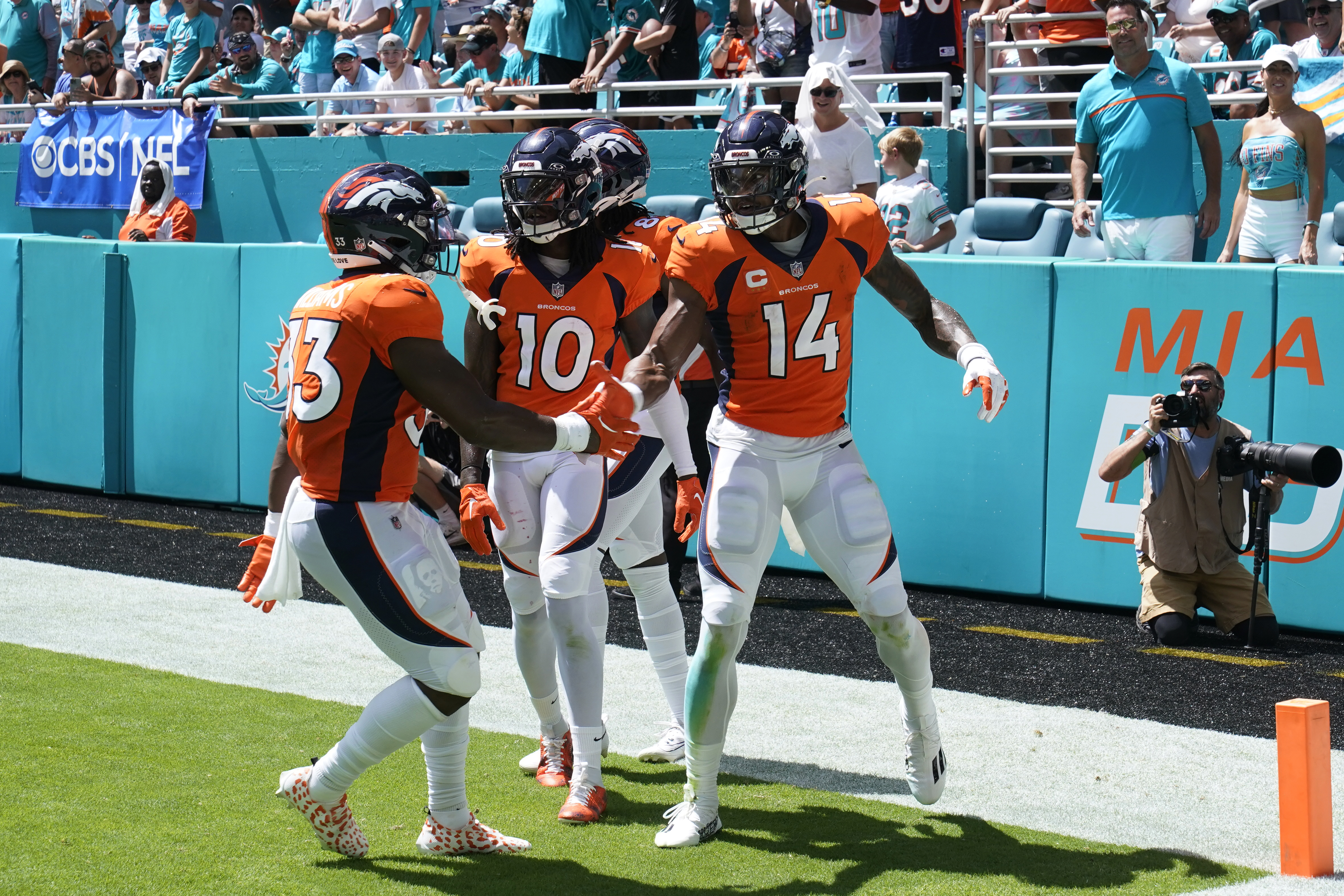 Pro Football: Dolphins demolish Broncos, 70-20, scoring the most