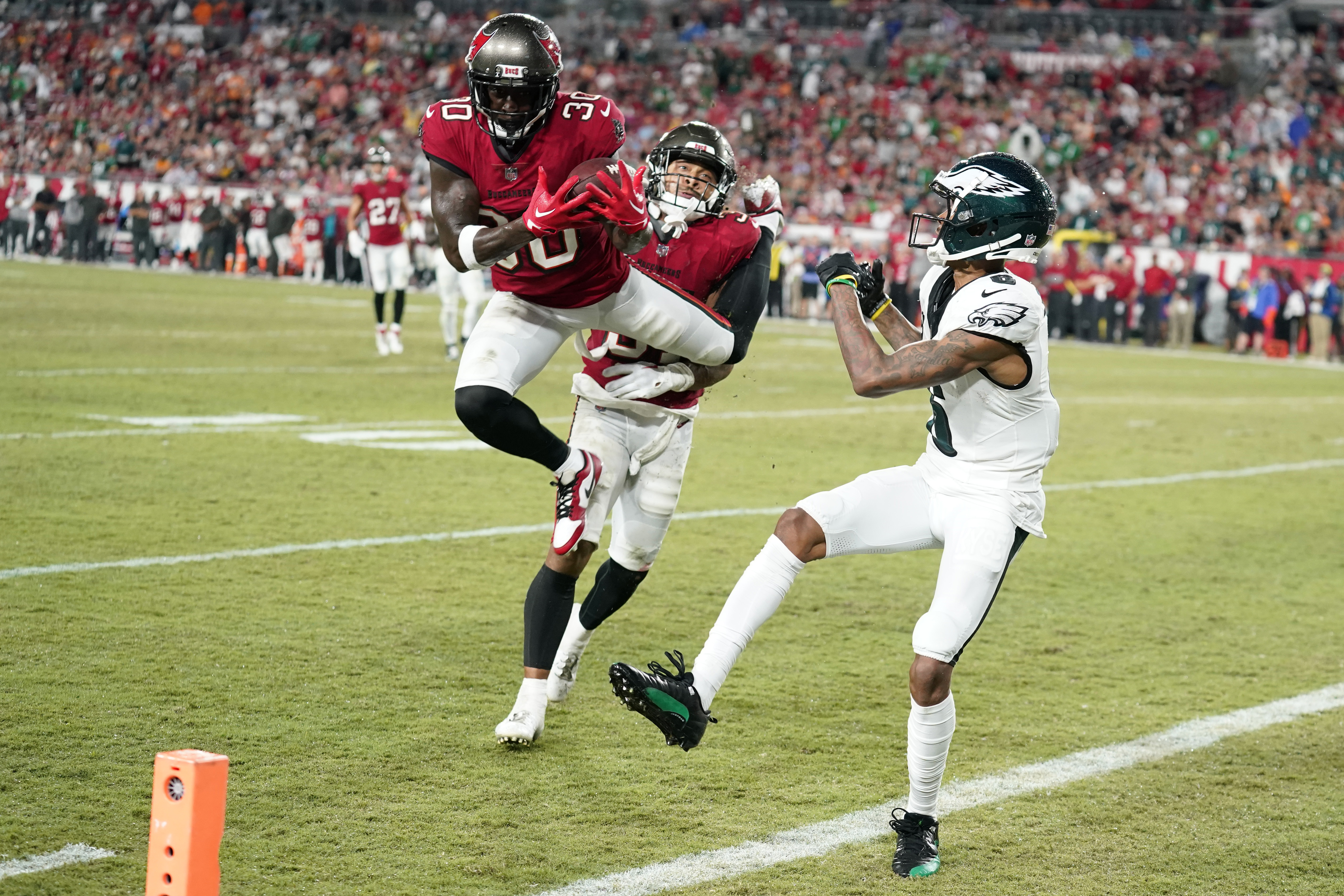 Jalen Hurts throws for TD, runs for another as Eagles thump Buccaneers  25-11 to remain unbeaten