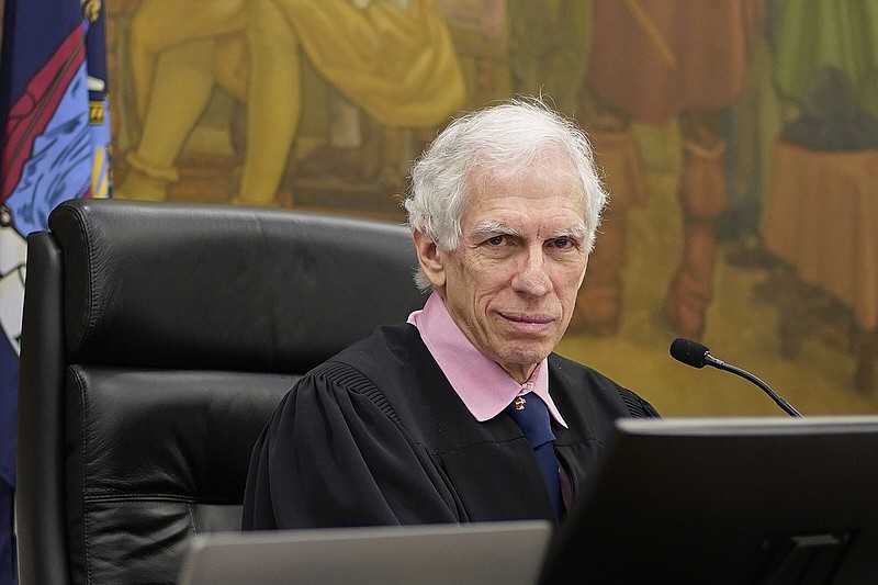 Judge Arthur Engoron, sits on the bench inside New York Supreme Court, Tuesday, Oct. 10, 2023, in New York. (AP Photo/Seth Wenig)