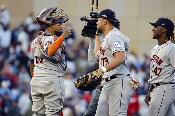 Martin Maldonado of the Houston Astros shows the crowd his World