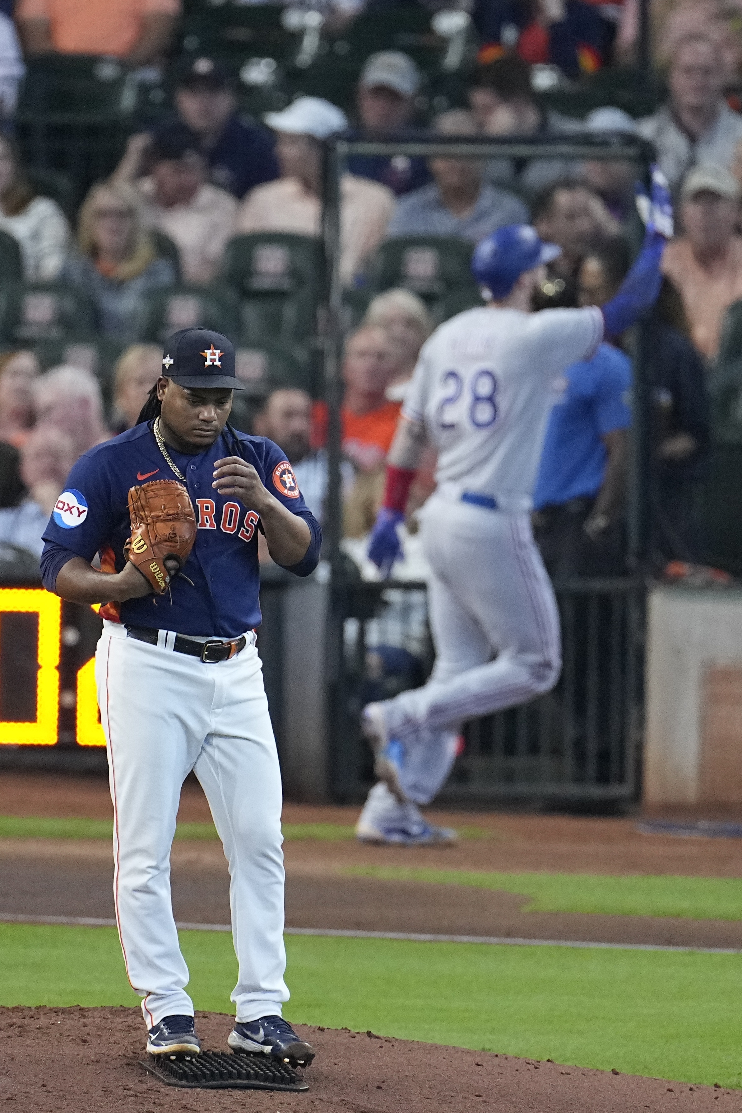 Texas Rangers' Leody Taveras follows through on an RBI single during the  fourth inning of the team's baseball game against the Atlanta Braves,  Wednesday, May 17, 2023, in Arlington, Texas. (AP Photo/Tony