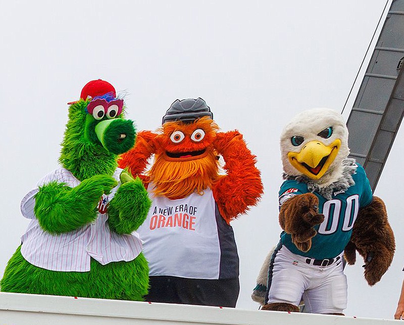 Mascots from professional Philadelphia sports teams were among the first to cross over the repaired section of I-95 when the highway reopened on Friday, June 23, 2023. (Alejandro A. Alvarez/The Philadelphia Inquirer/TNS)
