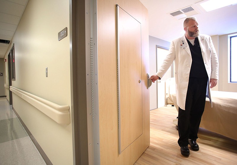 Dr. Brian Hyatt describes Northwest Health's Behavioral Health Unit in March 2018 in Springdale. Hyatt is charged with Medicaid fraud made his first court appearance in Little Rock on Thursday.
(File Photo/NWA Democrat-Gazette/David Gottschalk)