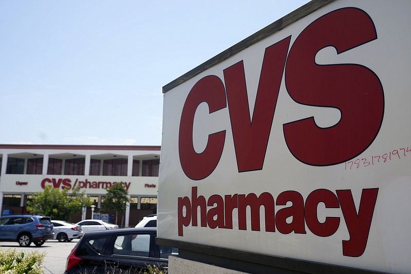 FILE - A sign marks a CVS branch on Tuesday, May 16, 2023, in Pasadena, Calif.  CVS Health is pulling from its drugstore shelves, Friday, Oct. 20,  some cough-and-cold treatments that contain an ingredient that has been deemed ineffective by doctors and researchers. (AP Photo/Marcio Jose Sanchez, File)