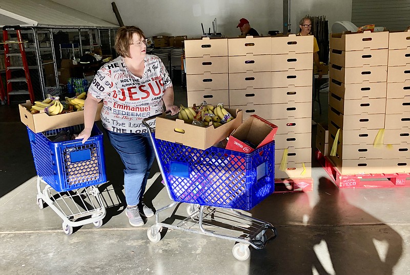 Families line up at Capital West Christian Church food pantry