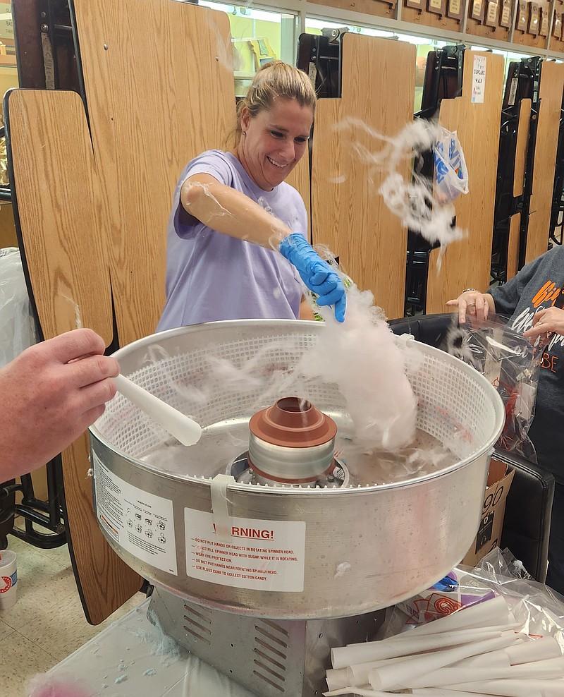 Emily O'Leary/Fulton Sun
New Bloomfield Elementary principal Jennifer Fletcher spins cotton candy at the New Bloomfield school carnival.
