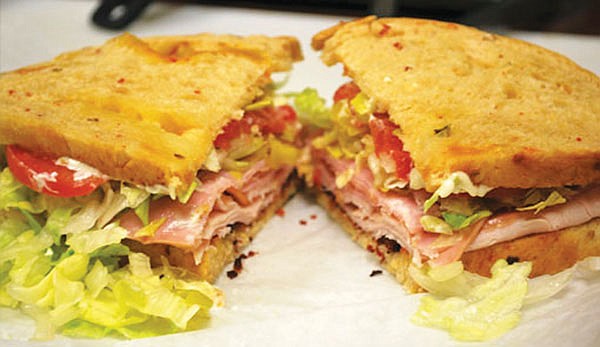 Stone Mill Breads club sandwich comes with ham, turkey and bacon on jalapeno and three-cheese bread.

(Courtesy Photo)