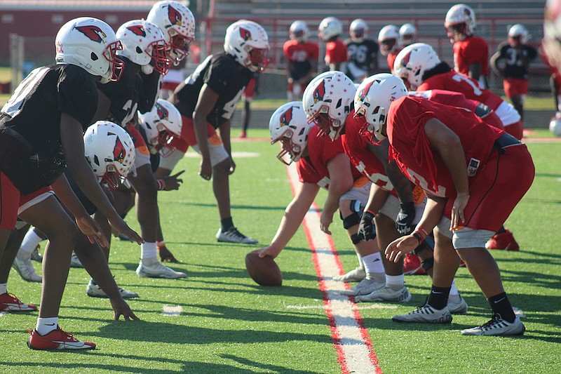 Photo By: Michael Hanich
The offensive and defensive line of the ϰϲͼ Fairview Cardinals prepare for a play in practice on Tuesday, October 24.