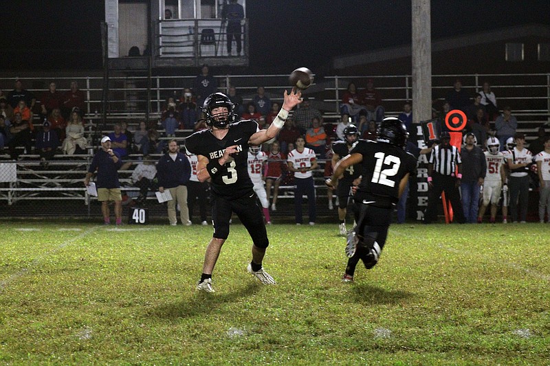 Photo By: Michael Hanich
Bearden Bears quarterback Bryce Whisenhunt throws the ball to an open receiver in the game against Baptist Prep. Whisenhunt completed 8-of-10 of his passes for 109 yards and an interception. He also rushed for 130 yards and two touchdowns on 12 carries.