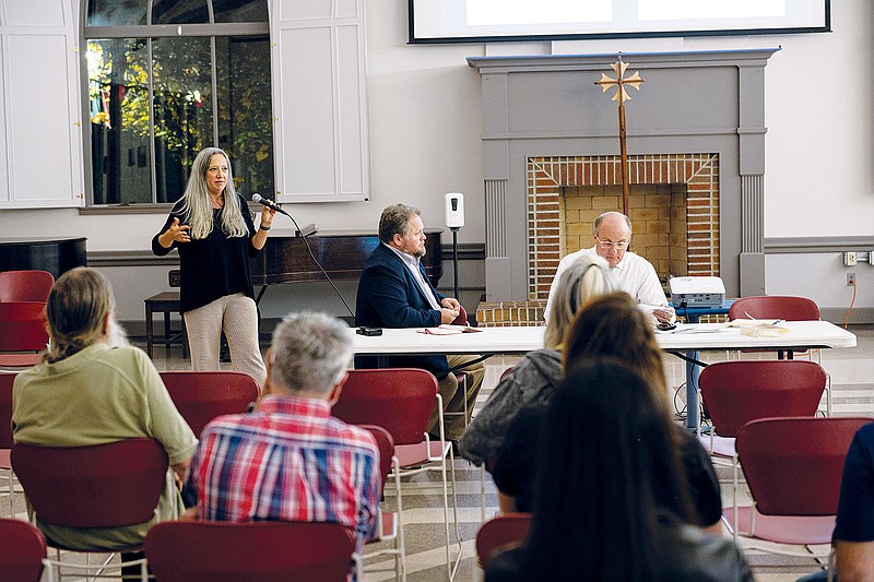 Jen Standerfer (left) speaks to a group Thursday at St. Pauls Episcopal Church in Fayetteville about making the state's Freedom of Information Act a constitutional amendment. Nate Bell (center) and Joey McCutchen were also on hand to discuss the efforts of their group, Arkansas Citizens for Transparency. Visit nwaonline.com/photos for today's photo gallery.

(NWA Democrat-Gazette/Spencer Tirey)