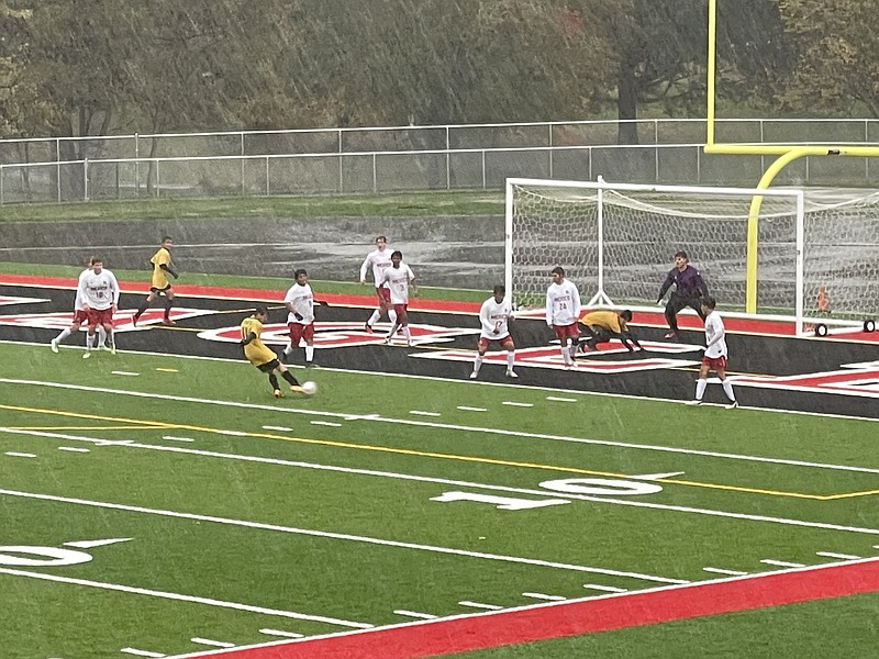 Fulton all-state forward Jayden Ayers takes a shot at goal against rival Mexico in the Class 2 District 4 opening round Saturday at Southern Boone High School in Ashland. Ayers scored six goals for the Hornets. (Robby Campbell/Fulton Sun)