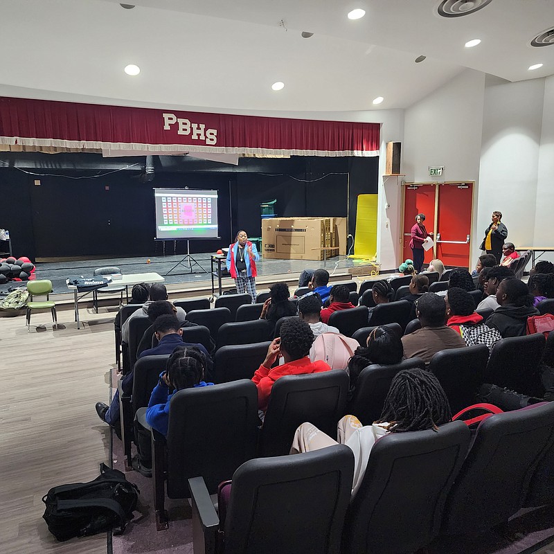 Yolanda Pitts, a member of Pine Bluff Pastors on Patrol, presents the At-Promise Institute at Pine Bluff High School. (Special to The Commercial)