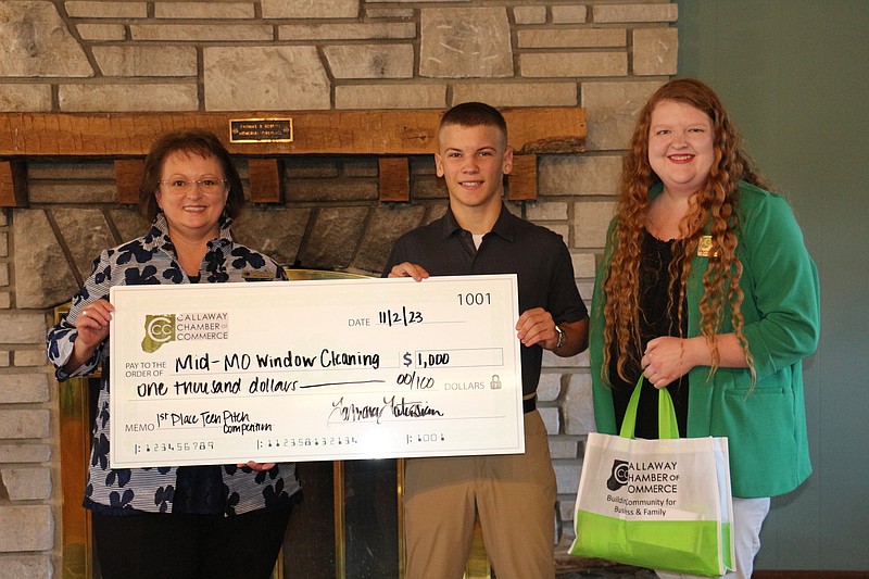 Photo courtesy Callaway Chamber of Commerce
Samuel Stevens (middle), owner of Mid-MO Window Cleaning and first place winner of the Show-Me Innovation Teen Pitch Competition, poses for a photo with Kim Barnes (left) and Brianna Kliethermes (right). For first place, Stevens received $1,000 in prize money.