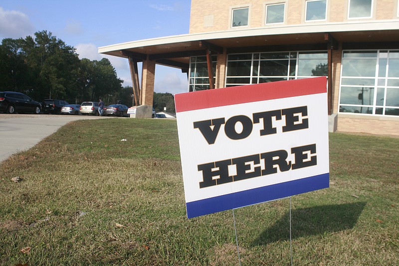 A sign invites voters to cast their ballots at the El Dorado Municipal Auditorium in this 2022 News-Times file photo. The Union County Election Commission voted unanimously this week to consolidate El Dorado's four polling places into one, at the Auditorium, and to close Felsenthal's lone polling place.