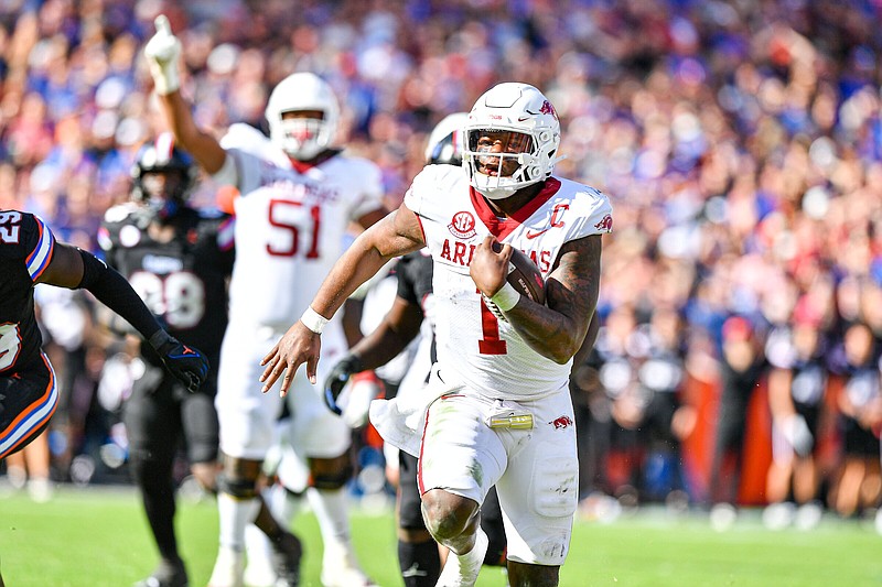 Arkansas quarterback KJ Jefferson (1) scores a rushing touchdown, Saturday, Nov. 4, 2023, during the fourth quarter of the Razorbacks 39-36 overtime win over the Florida Gators at Ben Hill Griffin Stadium in Gainesville, Fla. Visit nwaonline.com/photo for today's photo gallery.
(NWA Democrat-Gazette/Hank Layton)