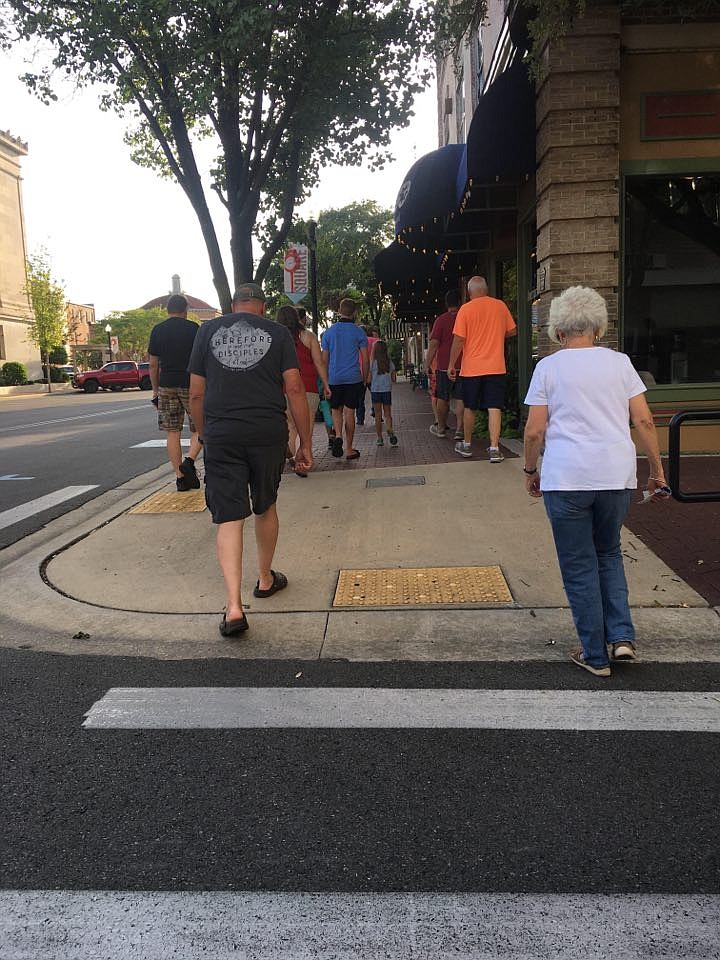 Local residents take a prayer walk in this 2020 News-Times file photo. The ninth annual 40 Days of Prayer walk will be held this Wednesday.