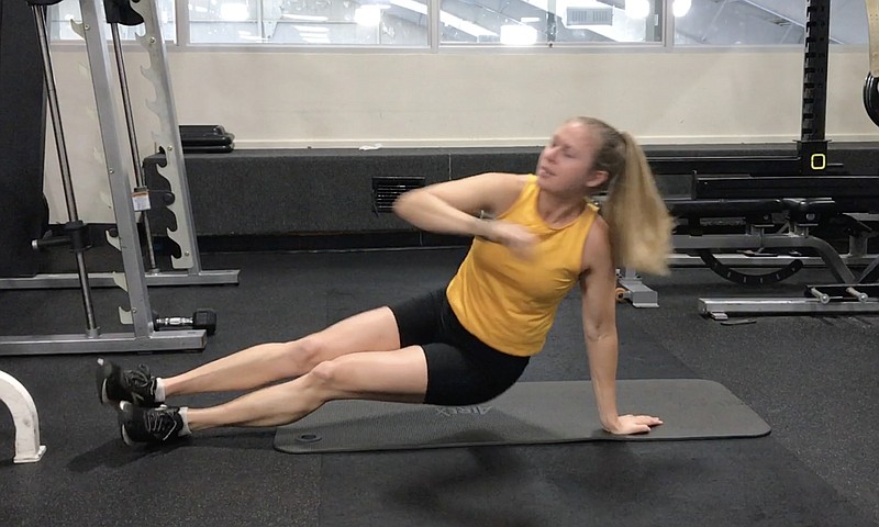 Heather Doherty demonstrates step 7 of the transition from roll-ups to pushups and back to roll-ups for Matt Parrott's Roll Up & Press exercise in the Nov. 13 Master Class column. (Arkansas Democrat-Gazette/Cela Storey 10.25.23)